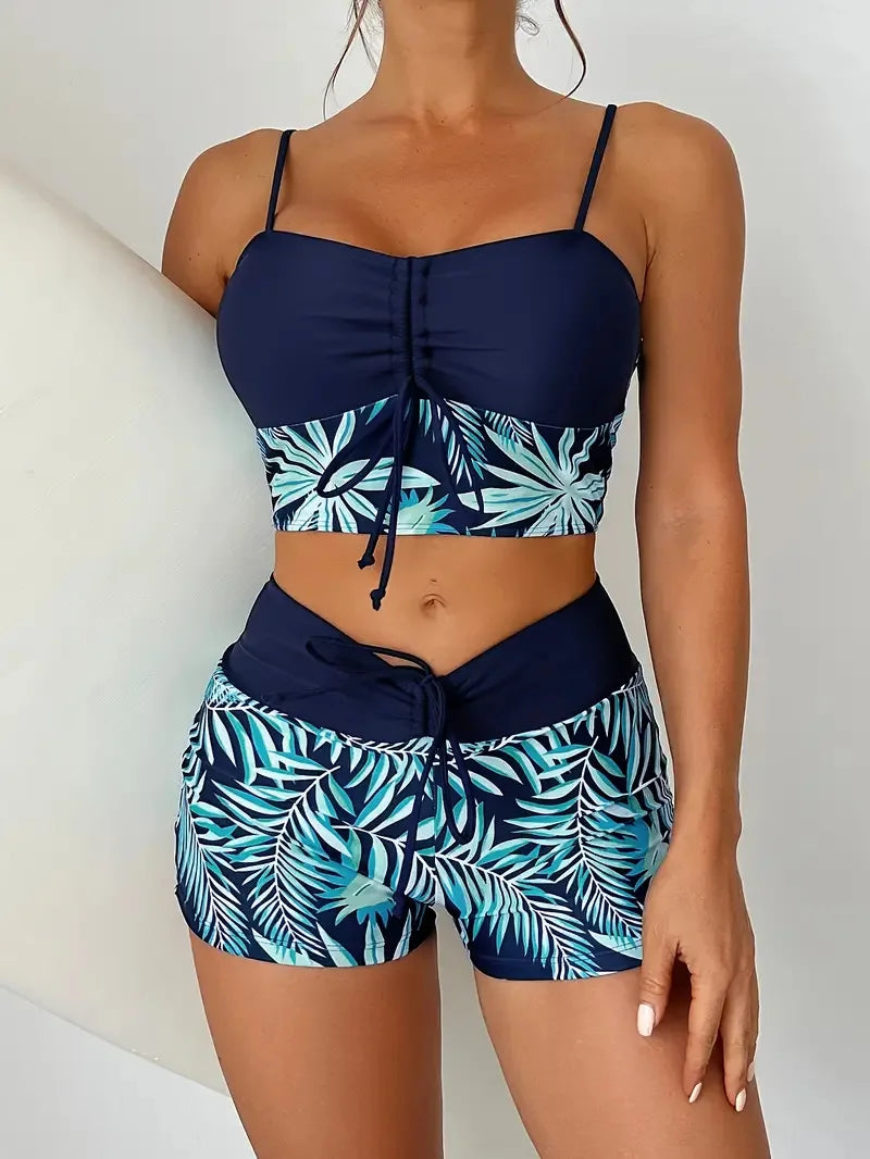 LuckeLadybug LLC bikini with high waist featuring a tropical leaf design and adjustable straps