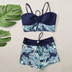 LuckeLadybug LLC bikini with high waist featuring a navy and tropical leaf design for stylish summer wear