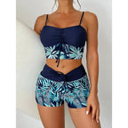 LuckeLadybug LLC bikini with high waist featuring a navy top and tropical print shorts for stylish beach wear