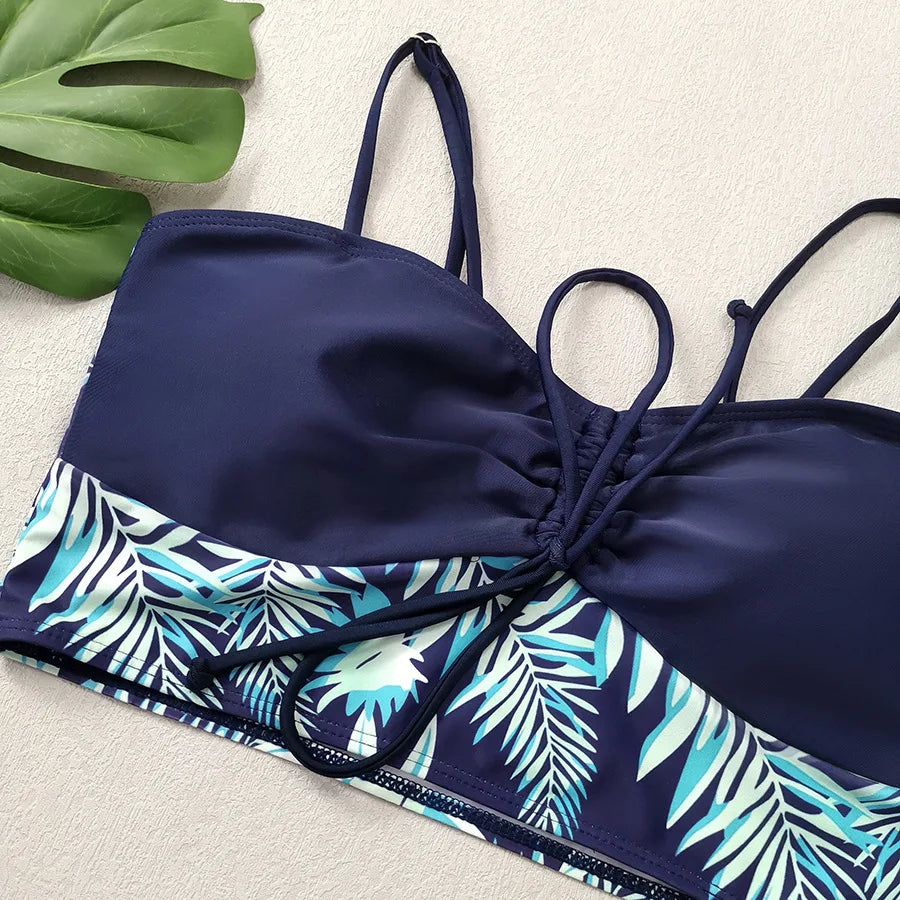 LuckeLadybug LLC bikini with high waist featuring a tropical leaf design and adjustable straps