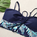 LuckeLadybug LLC bikini with high waist featuring a tropical leaf design and adjustable straps