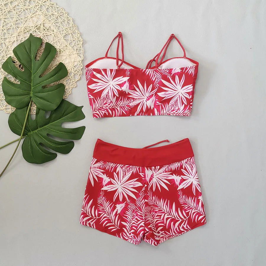 LuckeLadybug LLC red bikini with high waist featuring floral patterns and adjustable straps