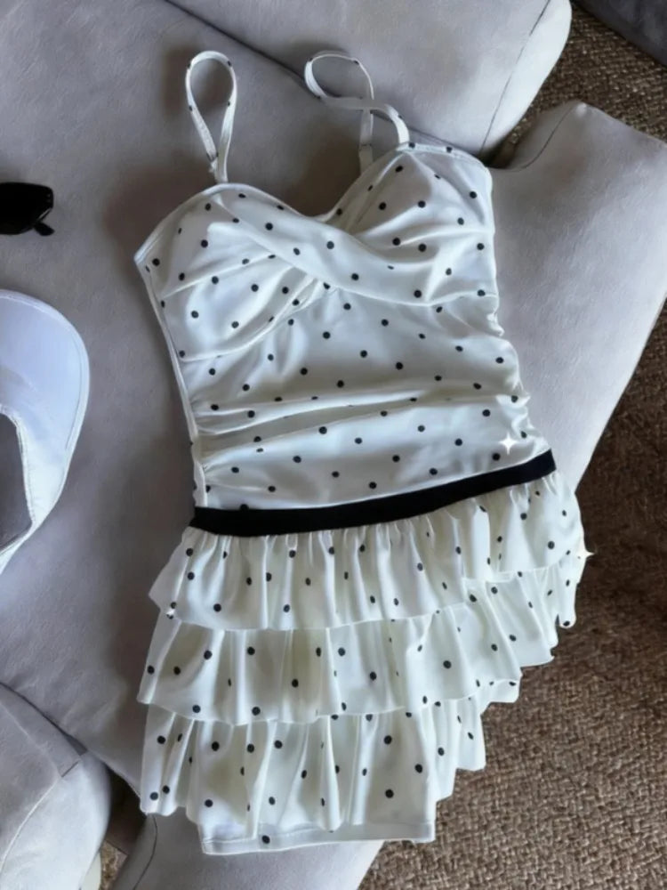 LuckeLadybug LLC bikini with high waist featuring polka dots and ruffled design for a stylish beach look