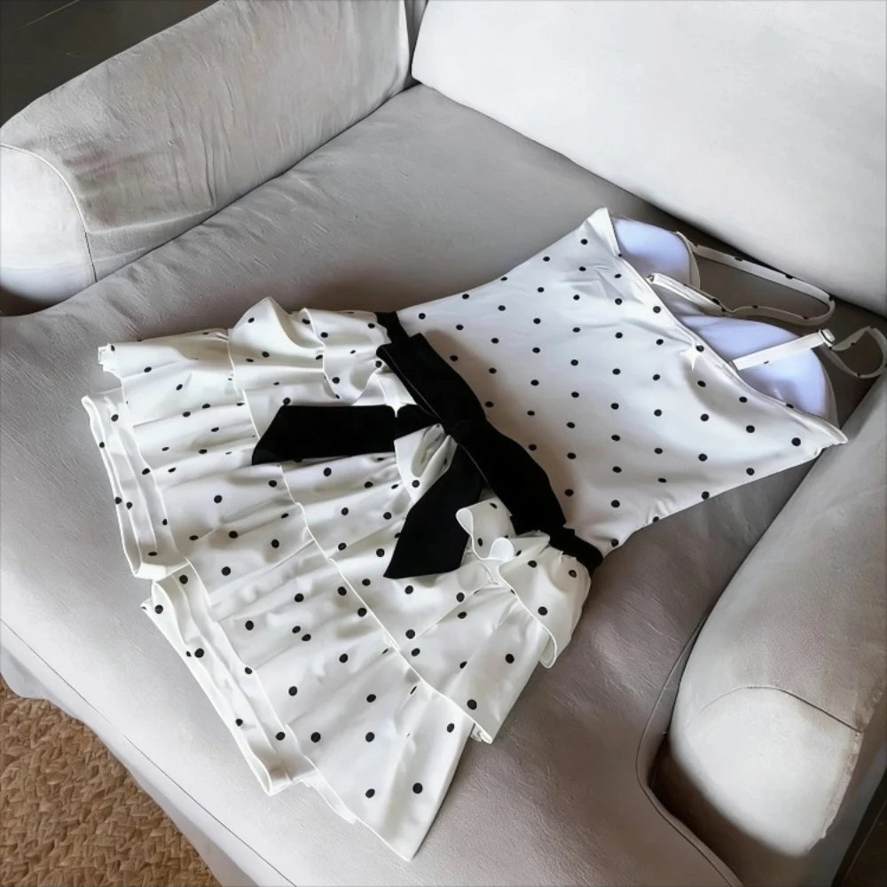 LuckeLadybug LLC bikini with high waist in polka dot pattern featuring a chic black bow