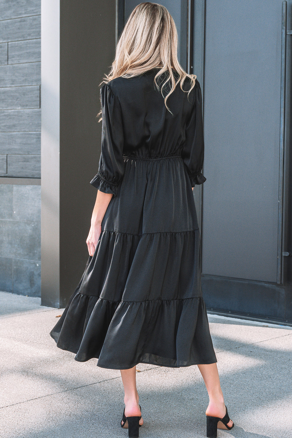 Elegant LuckeLadybug LLC fit & flare black maxi dress with tiered skirt and puff sleeves