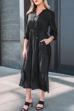 Chic black fit and flare maxi dress from LuckeLadybug LLC with pockets and stylish design