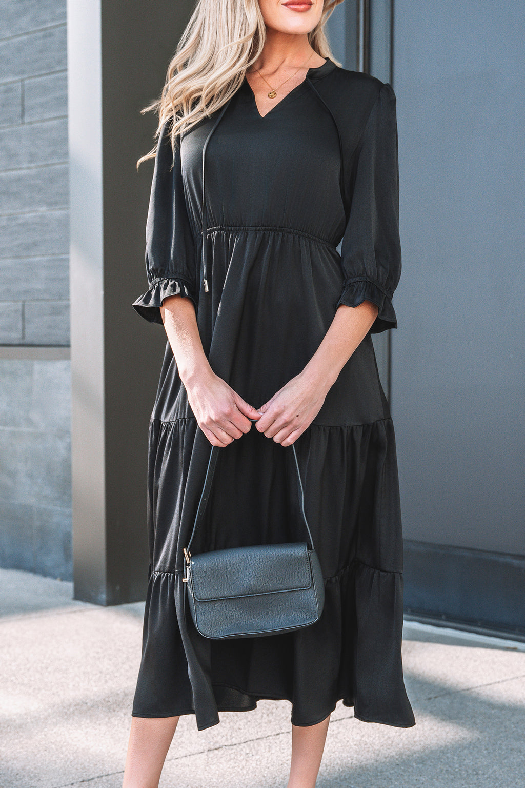 LuckeLadybug LLC Black Fit & Flare dress and maxi dress with tiered design and 3/4 sleeves