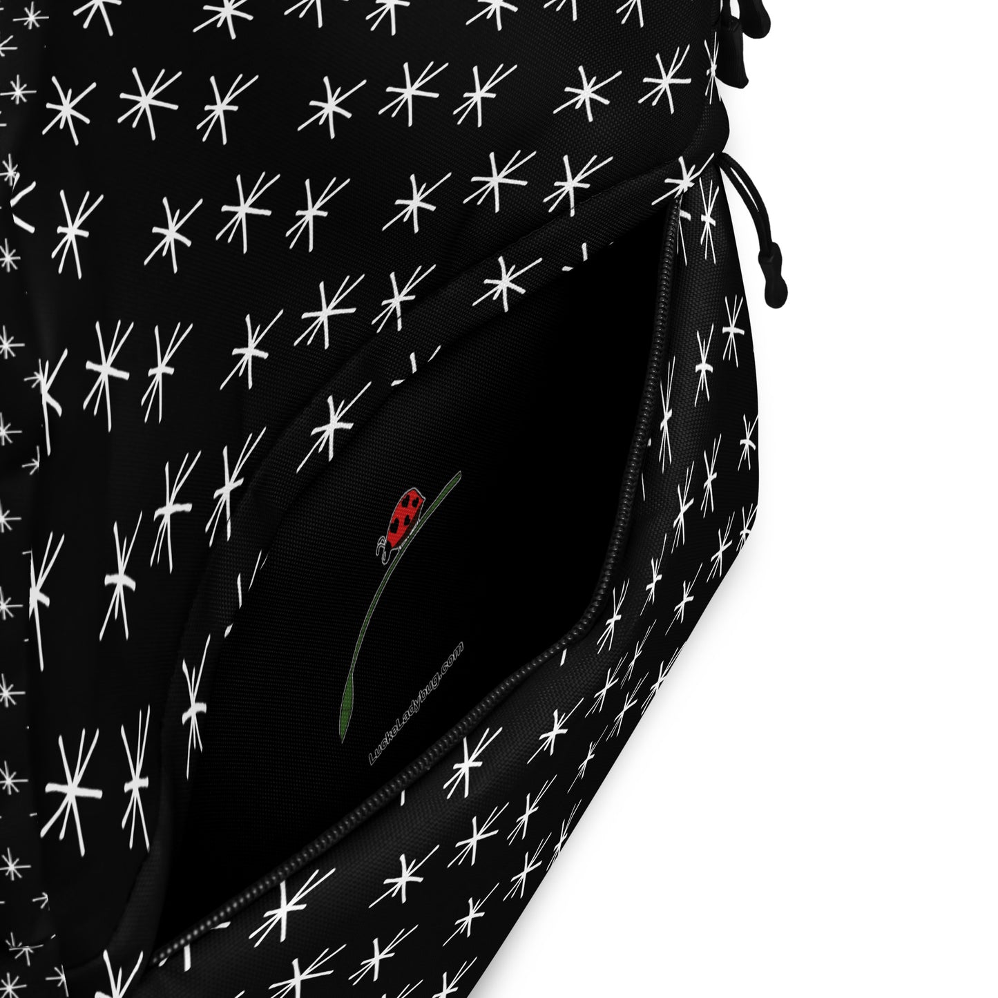 LuckeLadybug black backpack with white stars featuring a spacious interior and stylish design