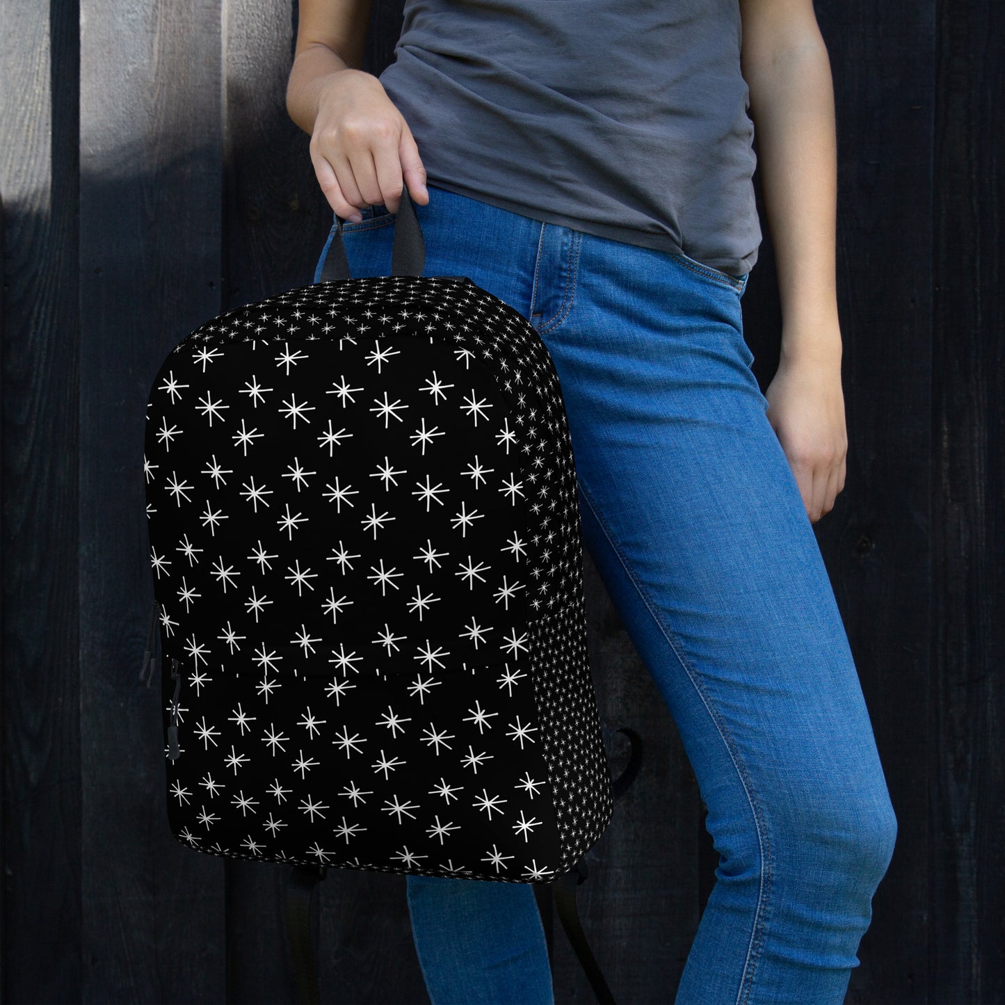 LuckeLadybug black backpack with white stars designed for stylish travel and daily use