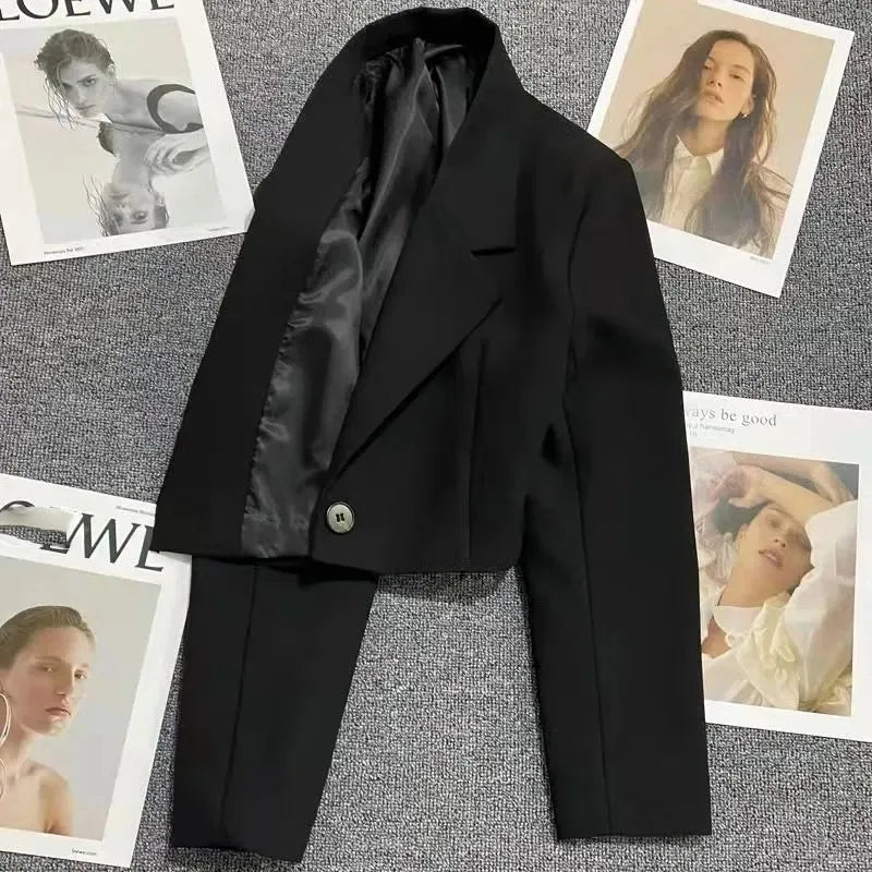 Stylish black cropped blazer for women with a sleek design and modern silhouette