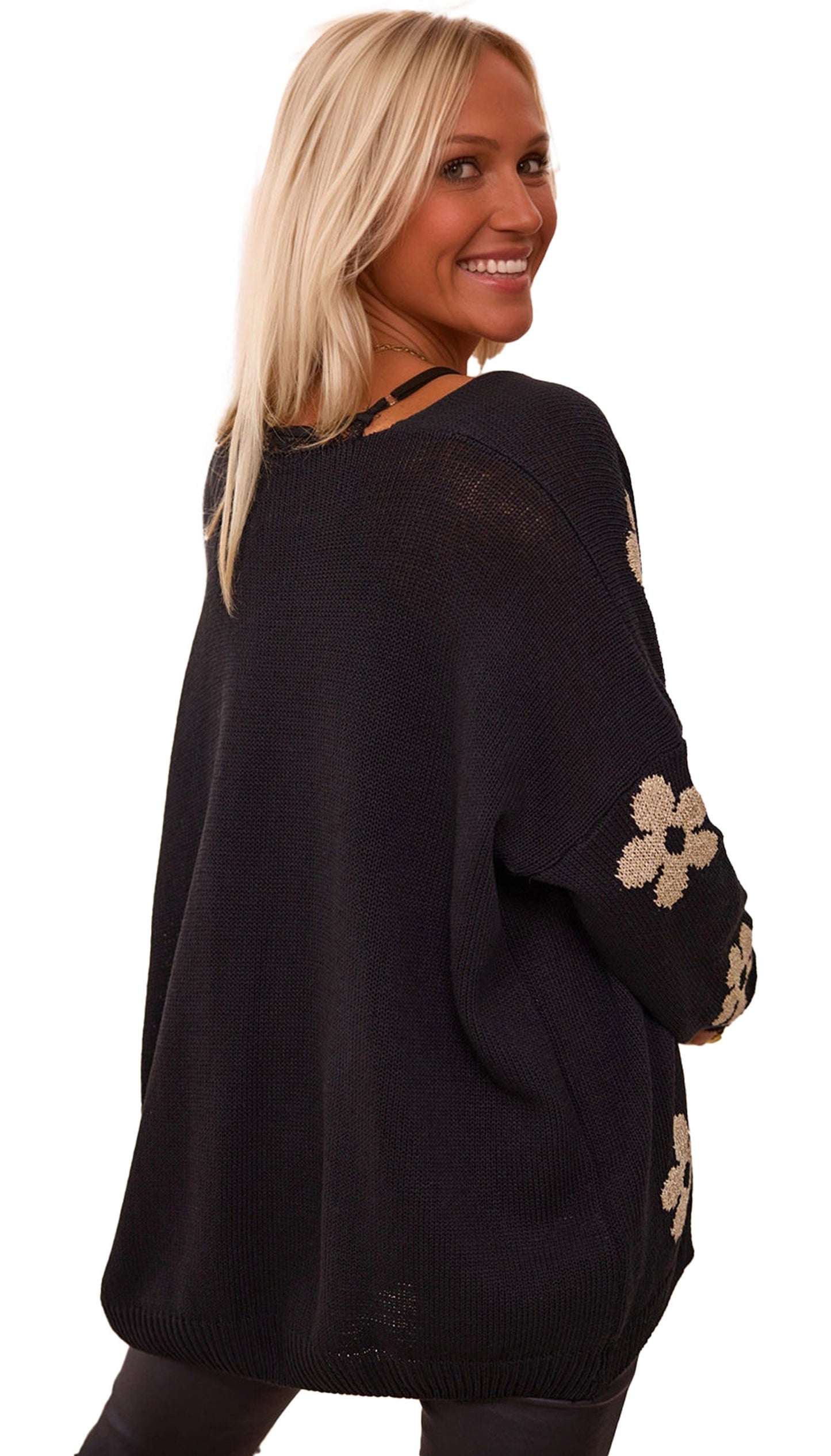 Stylish black floral knit cardigan featuring flower embroidery on sleeves for a trendy look