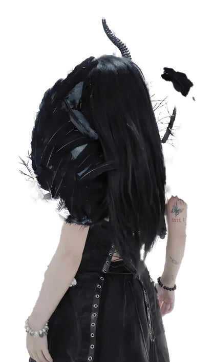 Black goth corset top for women, featuring dramatic feathered wings for a bold fashion statement