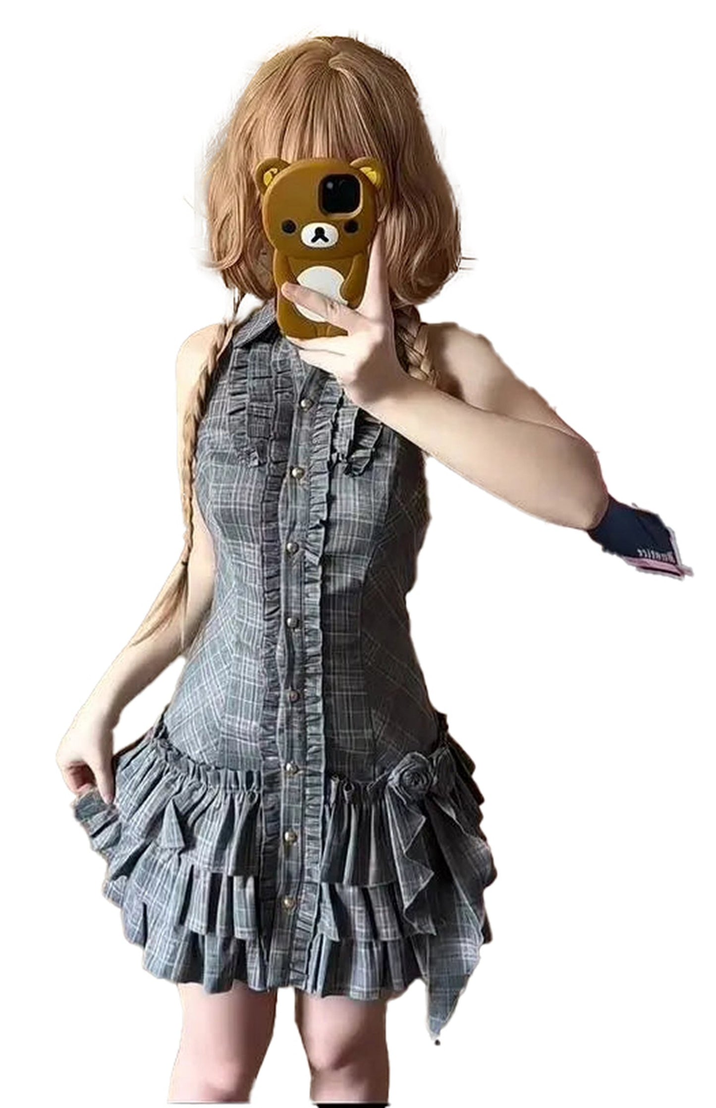 Model wearing a playful plaid mini dress with ruffles, showcasing a chic look