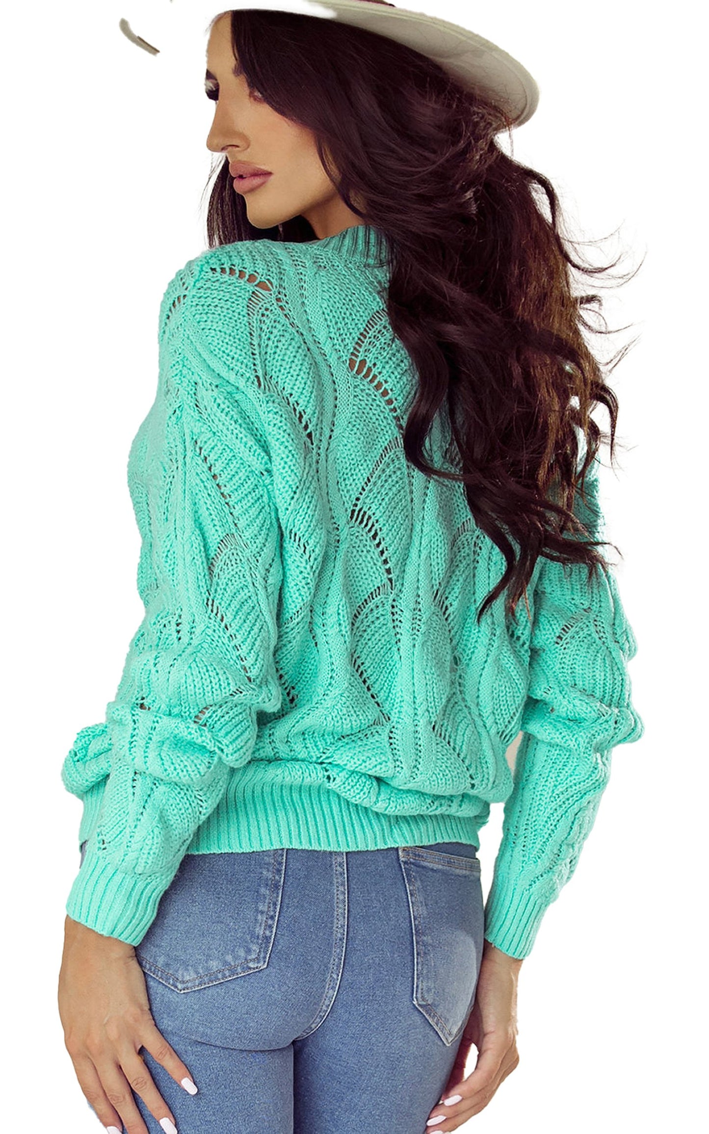 Model wearing a stylish mint green hollow out knit sweater from LuckeLadybug against a light background