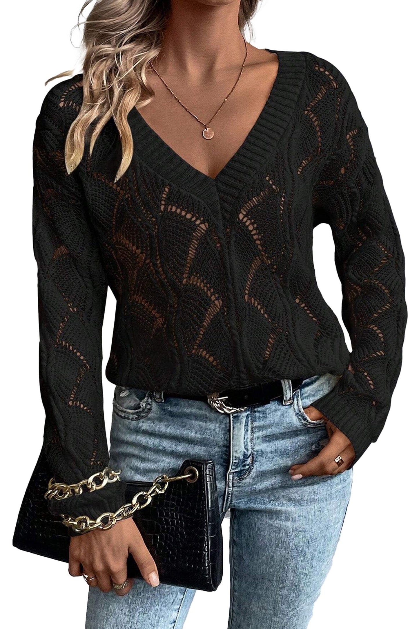 Black hollow out knit sweater with a V-neck design, perfect for stylish layering