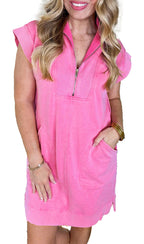 Casual pink mini dress with pockets and quarter zip, perfect for stylish summer outings