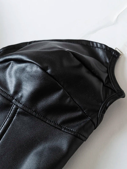 Close-up of a black strapless corset top featuring a sleek finish and structured design