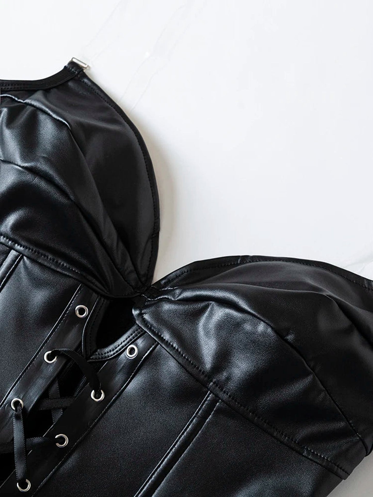 LuckeLadybug LLC black strapless corset top with lace-up detailing and smooth satin finish