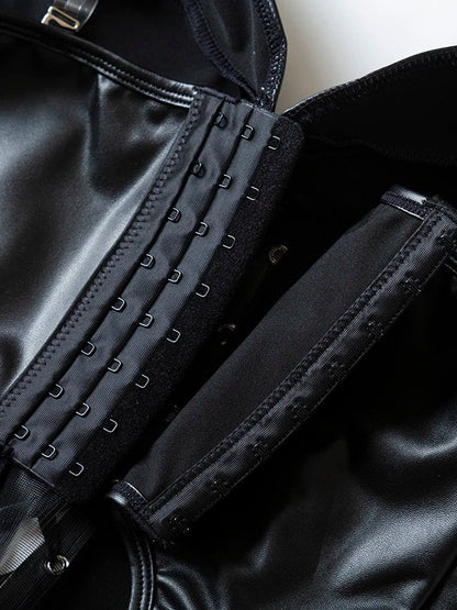 Close-up of LuckeLadybug LLC black strapless corset top showcasing hooks and sleek material