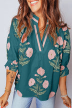 LuckeLadybug LLC blouse floral in teal with vibrant pink flower designs and a relaxed fit