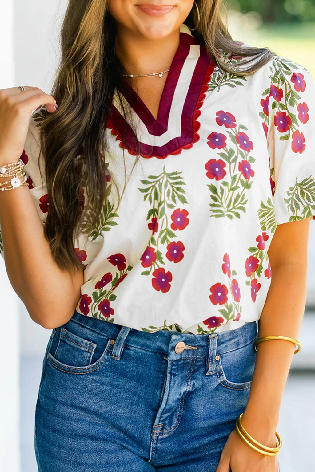 LuckeLadybug LLC blouse floral with vibrant red and green flower print and unique collar design