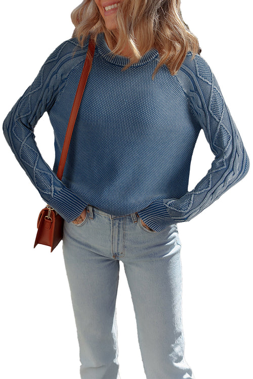 Blue cable knit sweater for women featuring a cozy design and stylish cable detailing on sleeves
