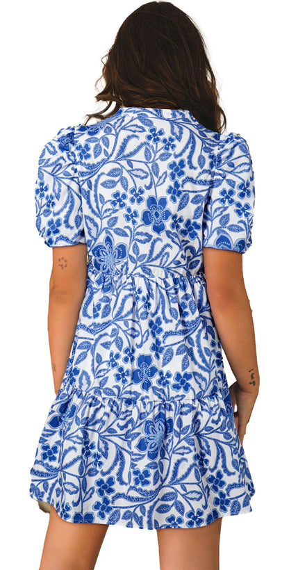 LuckeLadybug blue floral puff sleeve dress with a flowy tiered design and elegant floral patterns