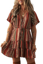LuckeLadybug Bohemian floral print dress with a tiered ruffle design and short sleeves