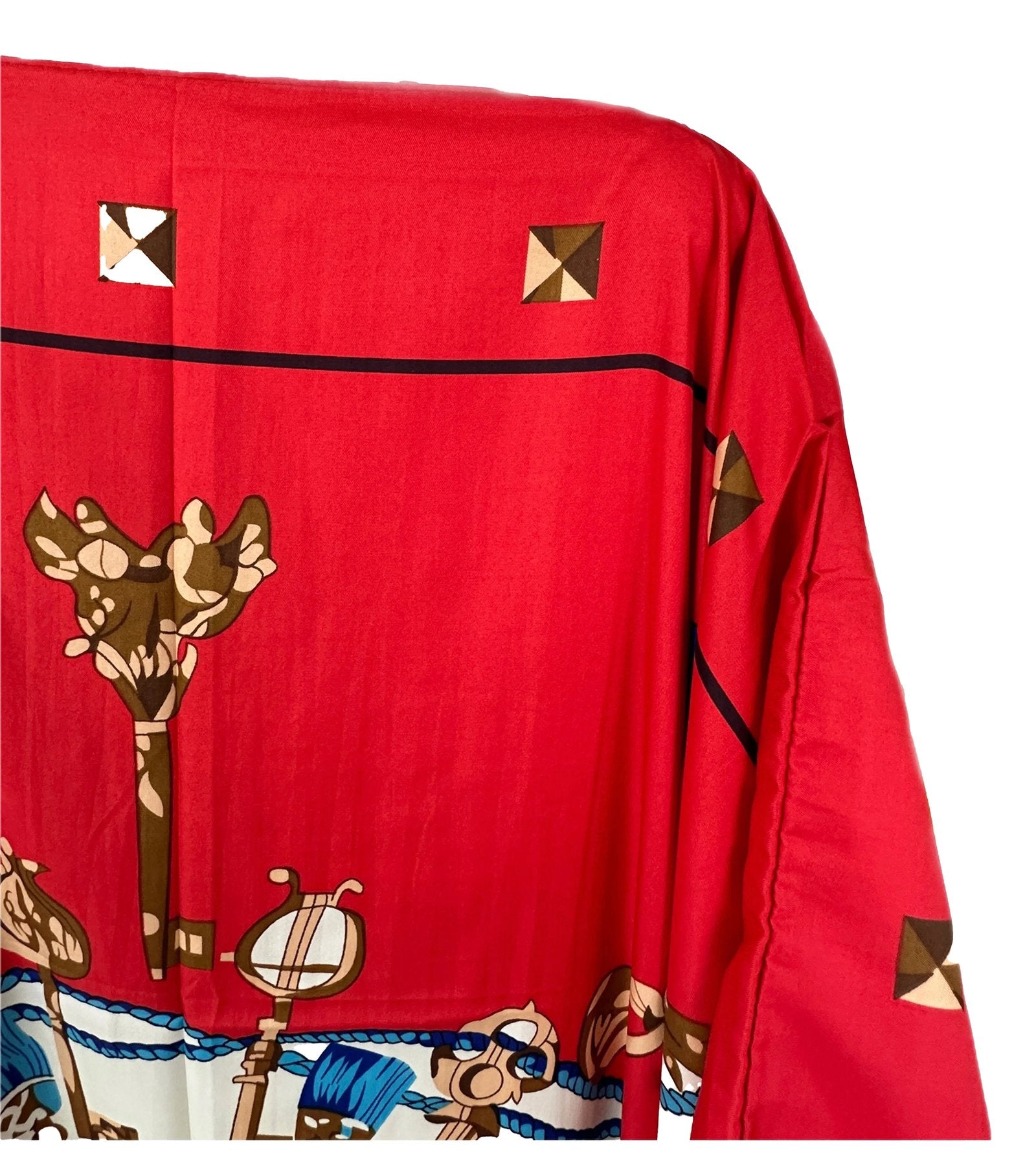 LuckeLadybug LLC Bohemian paisley print dress in vibrant red with unique design details