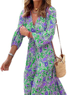 LuckeLadybug LLC Bohemian v-neck autumn dress featuring a colorful paisley pattern and long sleeves