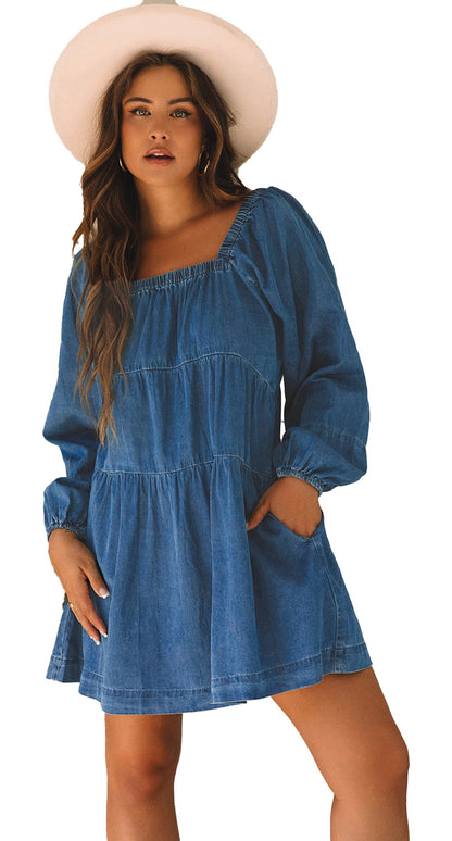 Woman in a dusk blue denim mini dress with long puff sleeves square neckline and pockets