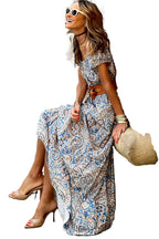 LuckeLadybug blue boho paisley maxi dress off shoulder belted style worn with tan heels and sunglasses
