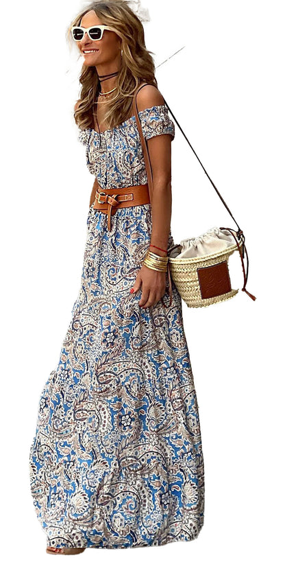 LuckeLadybug model wearing a blue boho paisley maxi dress with off shoulder sleeves brown belt straw bucket bag