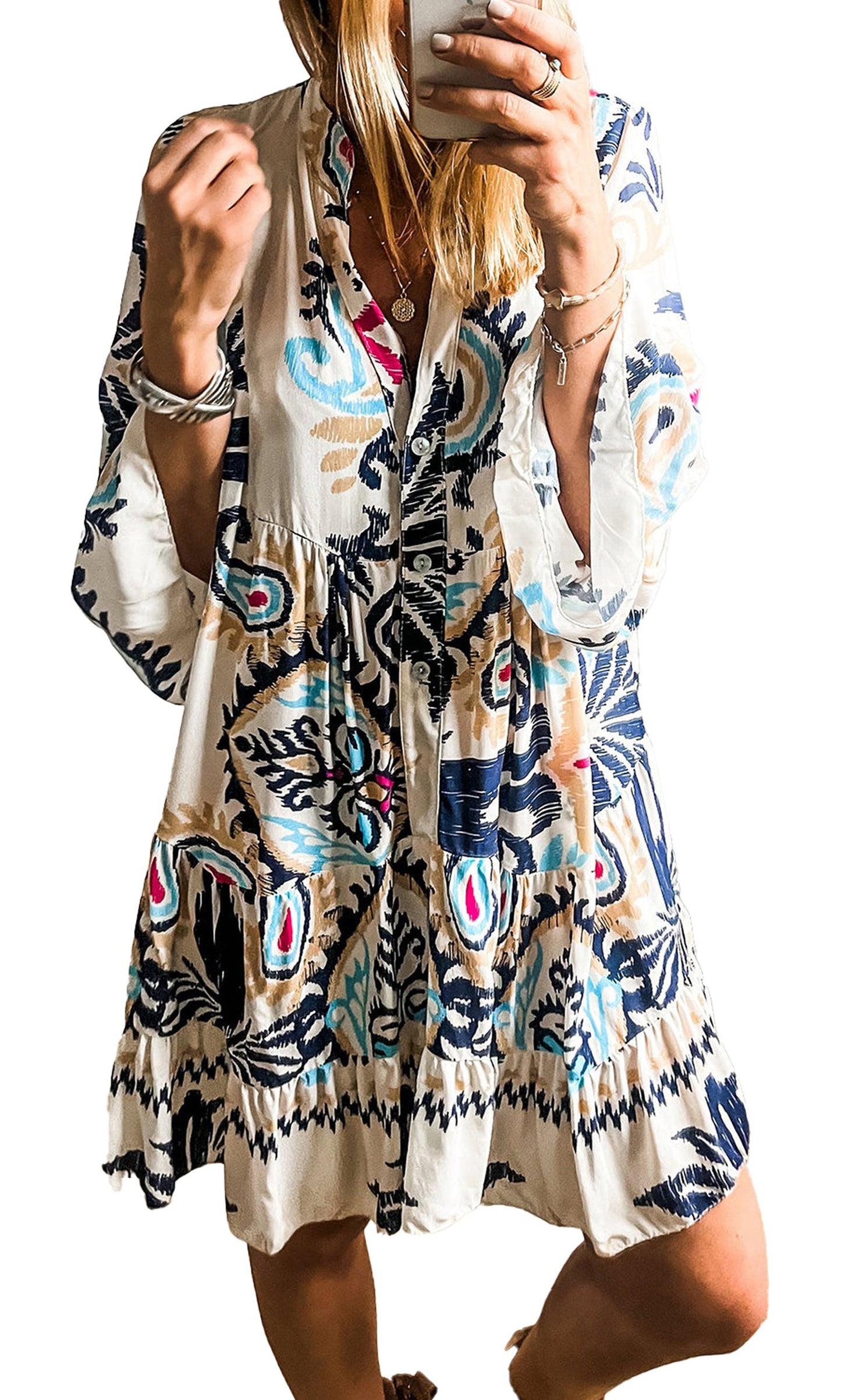 Woman wearing LuckeLadybug white tribal print mini dress with bell sleeves and V neck mirror selfie