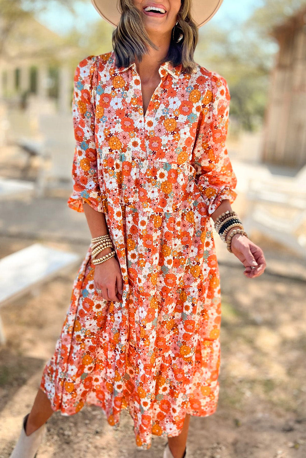 LuckeLadybug boho floral ruffled dress in orange with a relaxed fit and button-up front, perfect for spring outings