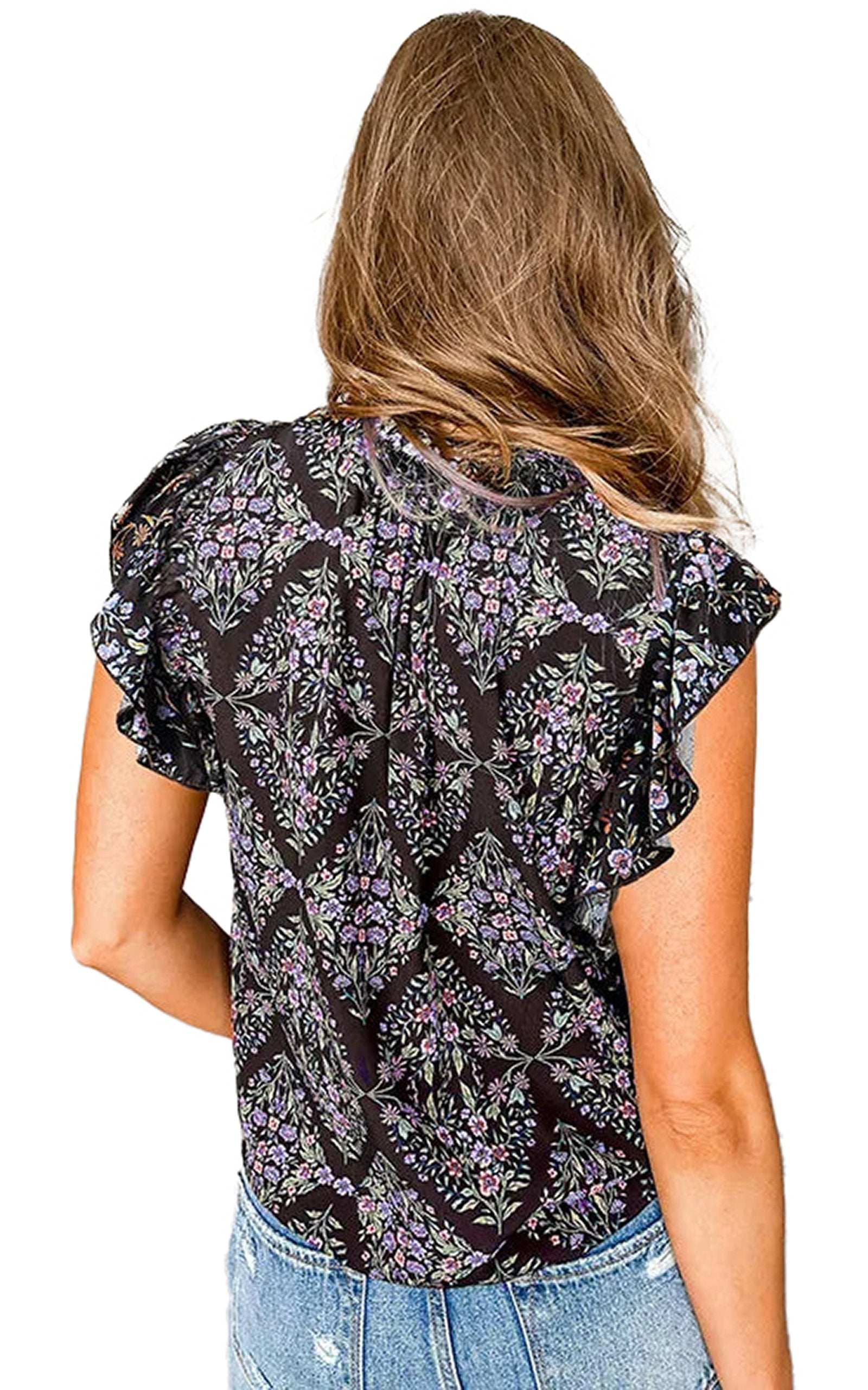 Back view of a boho floral sleeveless blouse by LuckeLadybug LLC with ruffled sleeves and intricate patterns