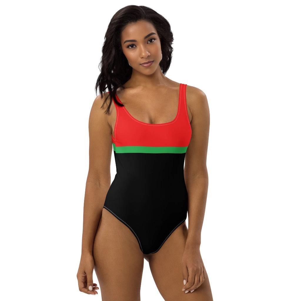 LuckeLadybug bold color one-piece swimsuit in red black and green with scoop neckline