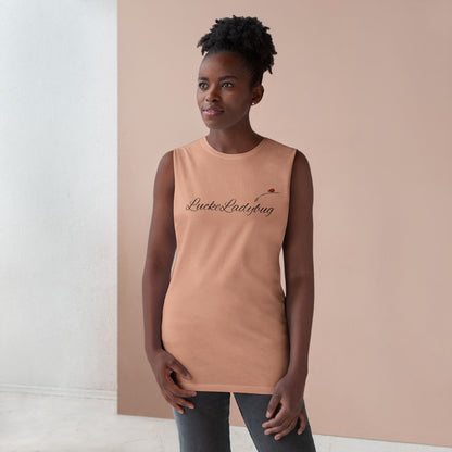 LuckeLadybug bold ladybug print tank in tan worn by woman with natural hairstyle