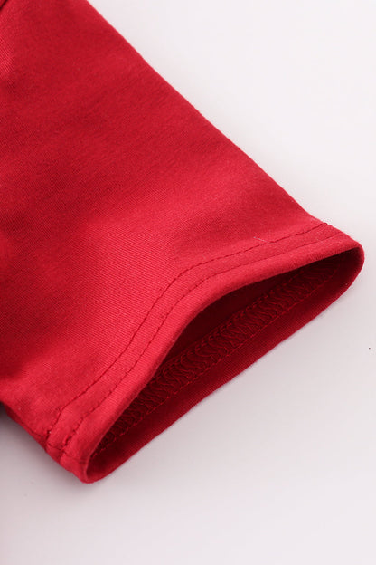 Close-up of red boys southern football applique outfit shirt sleeve by LuckeLadybug