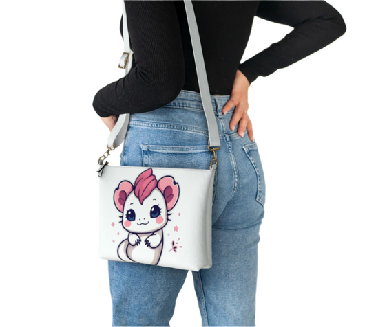 LuckeLadybug vegan leather cute axolotl crossbody bag worn by person with black top and jeans