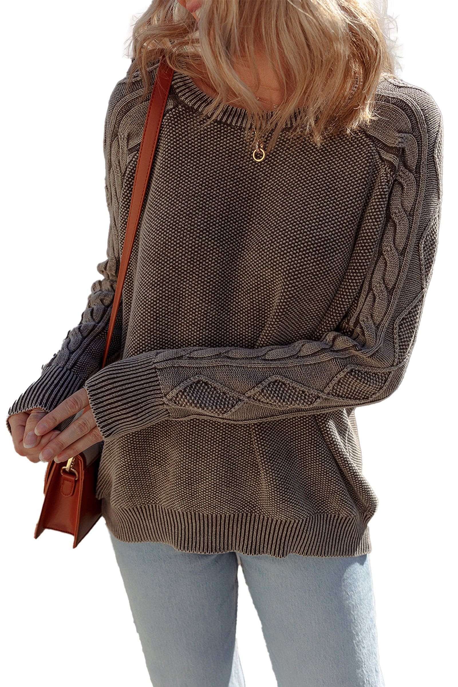 Stylish blue cable knit sweater for women featuring unique cable detailing and a comfortable fit