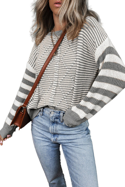 LuckeLadybug brown stripe geometric sweater paired with high-waisted jeans for a casual fall look
