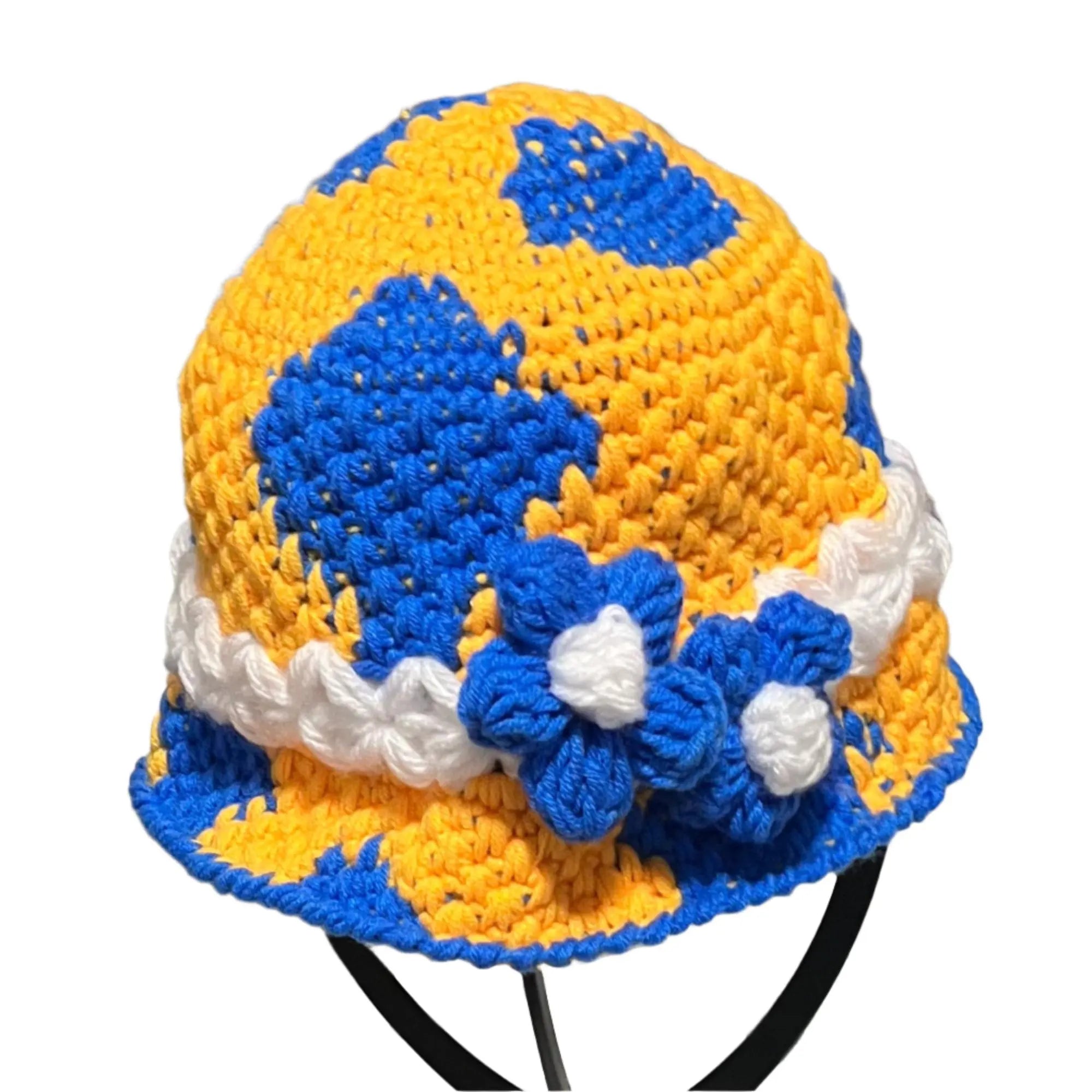 Colorful crochet bucket hat bucket in yellow and blue with a white flower detail