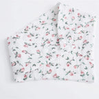LuckeLadybug cotton burp cloths featuring a floral design for stylish feeding moments
