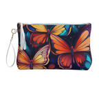 Printful vegan leather butterfly design cosmetic bag with colorful butterflies and tassel zipper pull