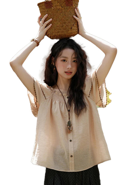 Lightweight butterfly sleeve blouse for women in peach with button details and relaxed fit