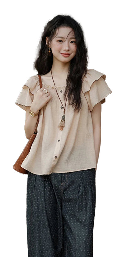 LuckeLadybug LLC Butterfly sleeve blouse for women in soft beige with ruffle details and button closure