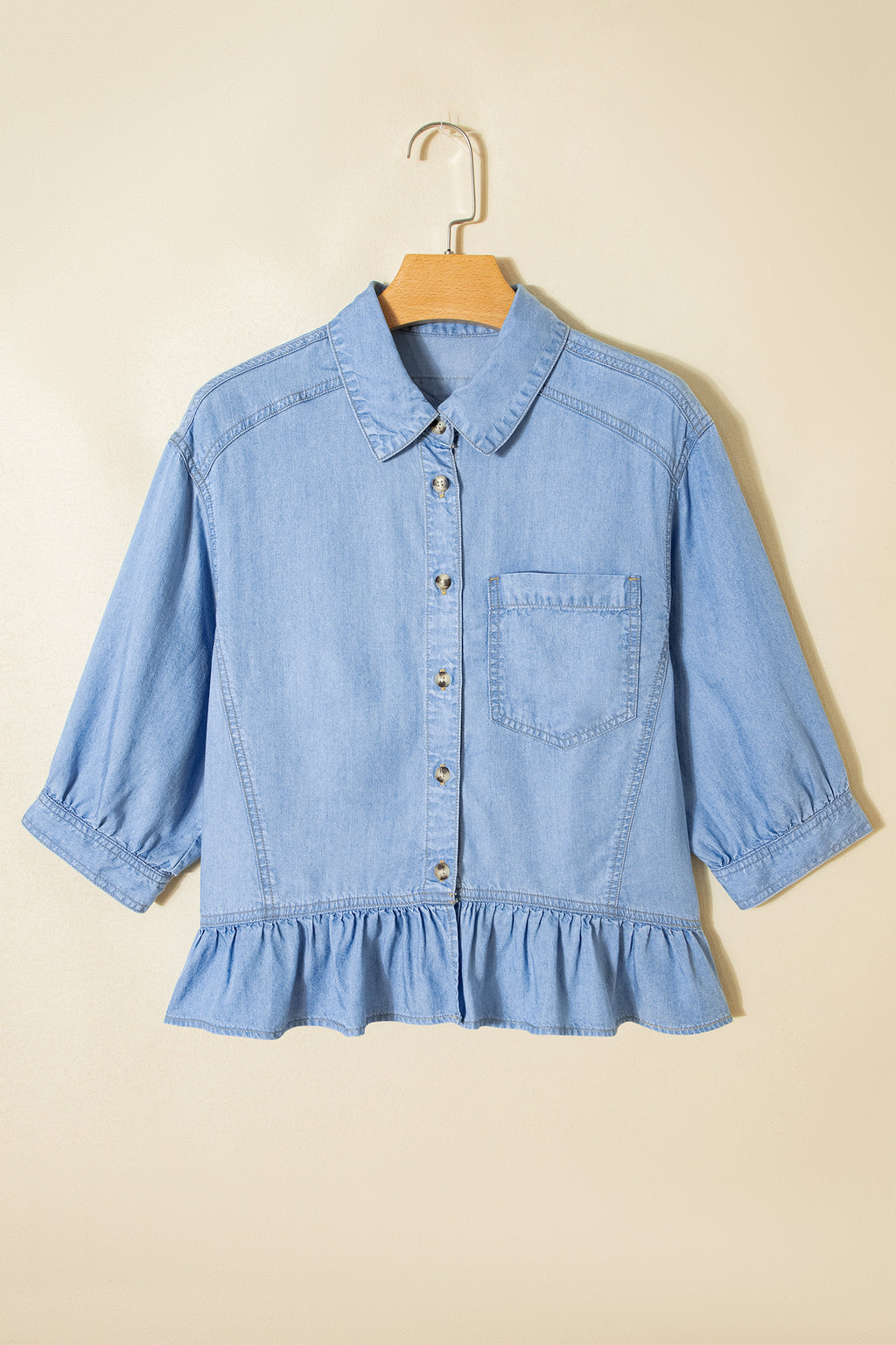 Light blue button-down shirt for men with a peplum hem and chest pocket