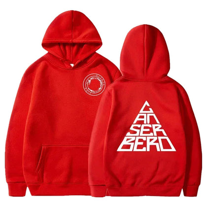 Red unisex Canserbero hoodie featuring logo on front and bold design on the back