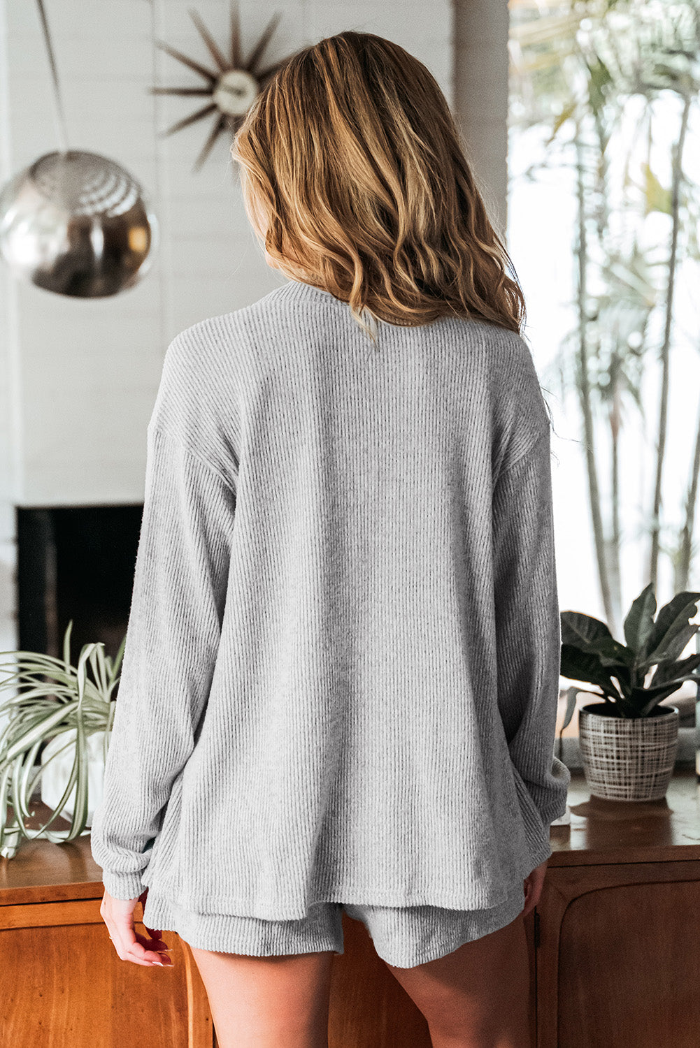 Light gray cardigan cardigan styled with matching shorts, perfect for cozy days at home